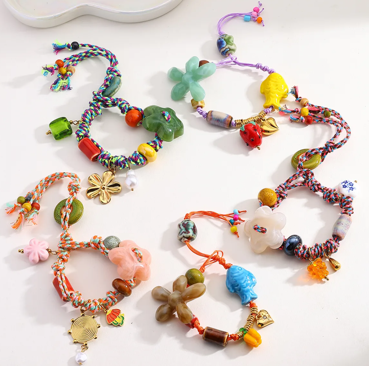POS 193 Pulseras hilo colores
